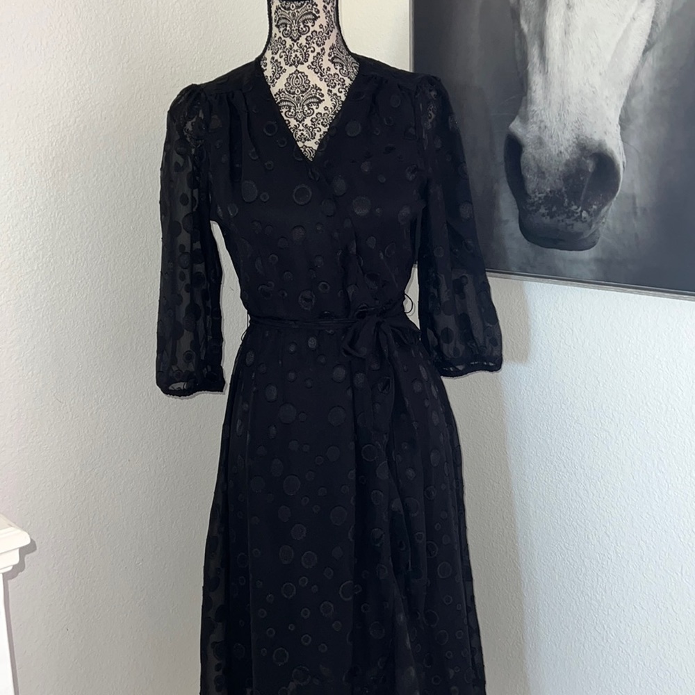 Black polka dotted dress